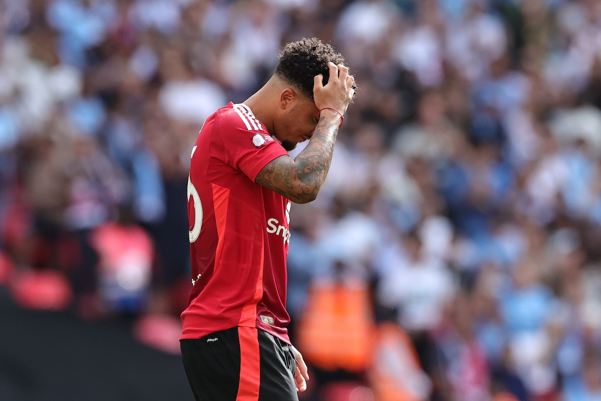 Jadon Sancho reacts after missing his penalty for Man United in the Community Shield final at Wembley.