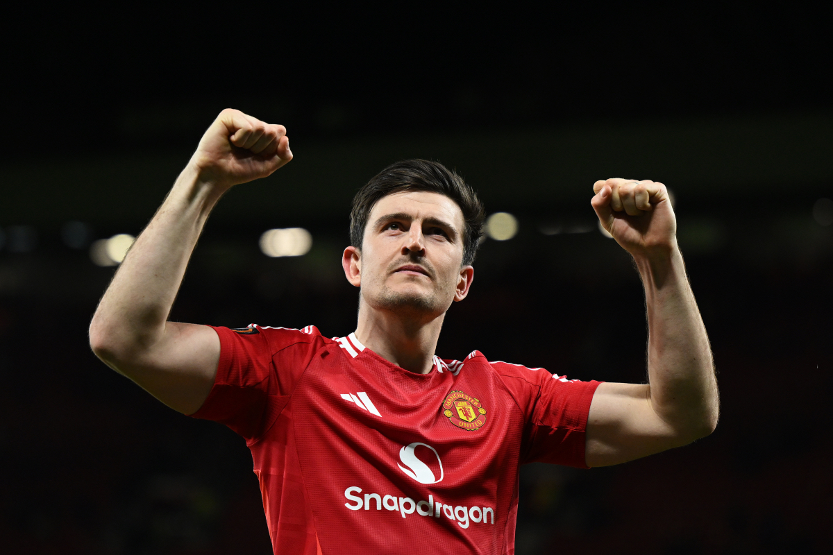 Harry Maguire celebrates with the Man Utd fans at Old Trafford