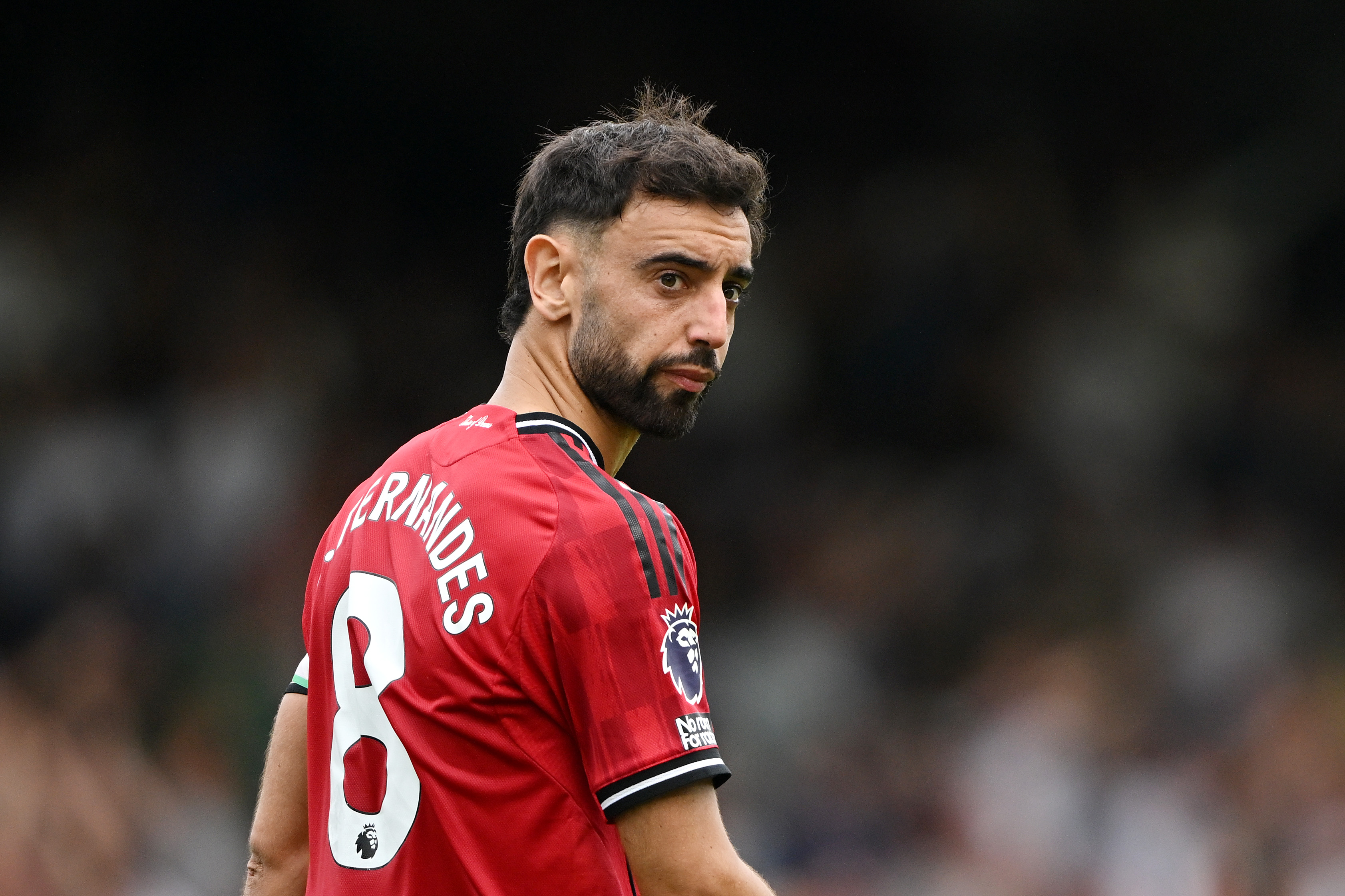 Bruno Fernandes looks on while in action for Man United vs Fulham.