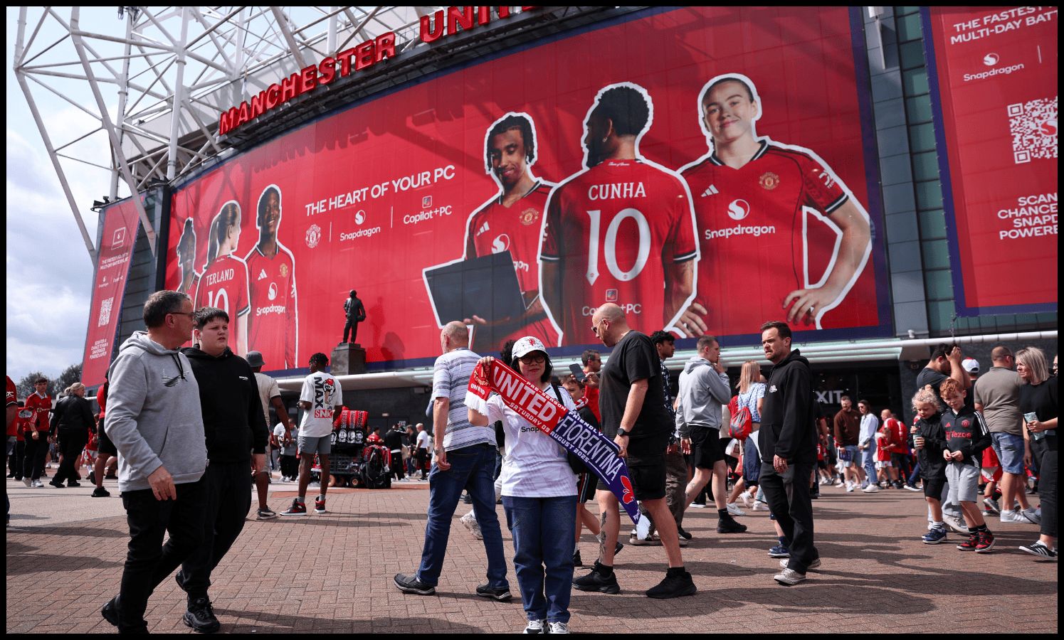 Man United fans gather outside Old Trafford on matchday.