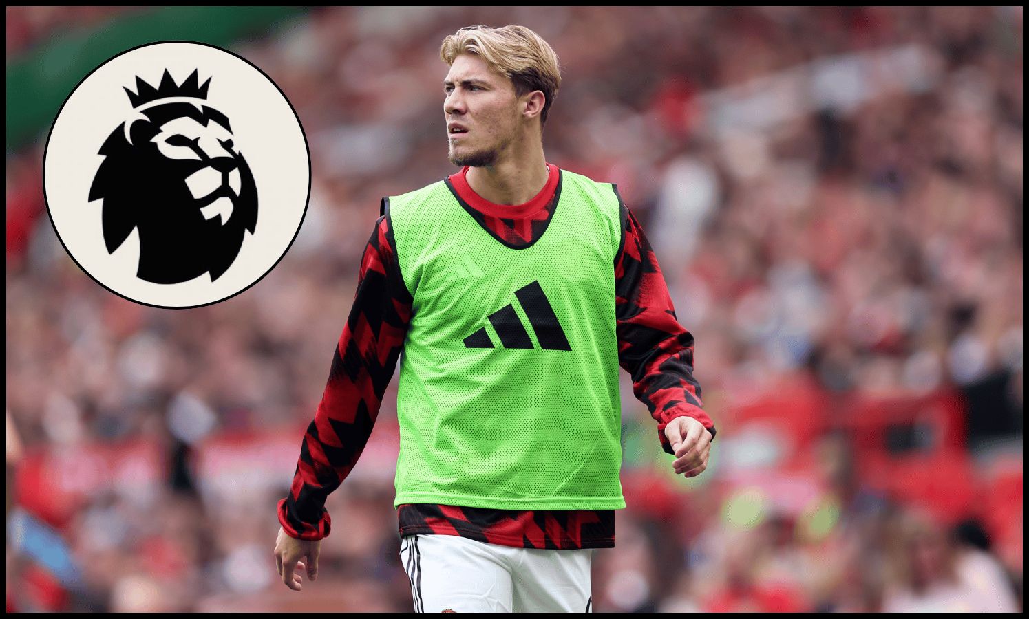 Rasmus Hojlund warms up on the touchline for Man United at Old Trafford.