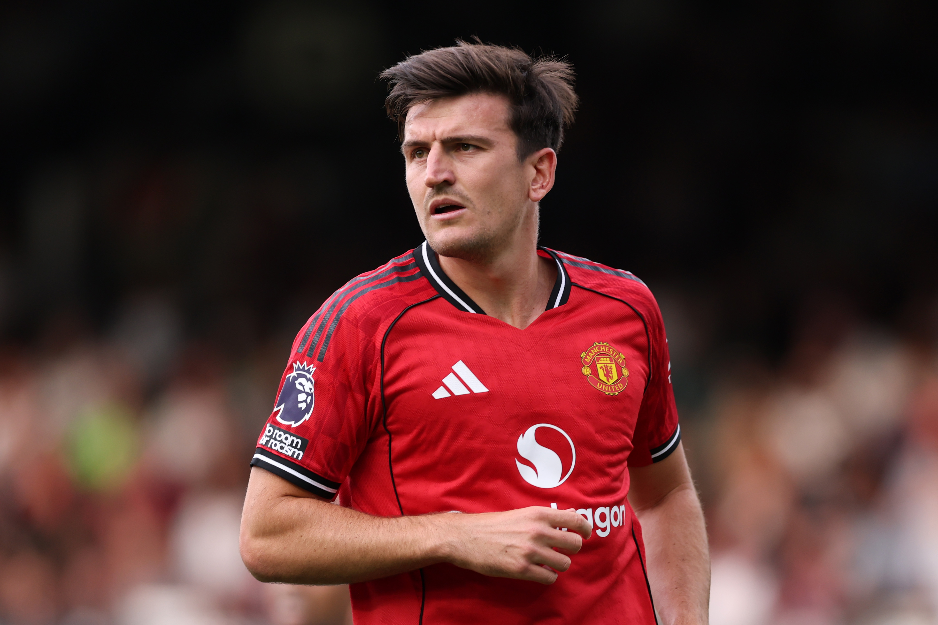 Harry Maguire in action for Man United vs Arsenal at Old Trafford.