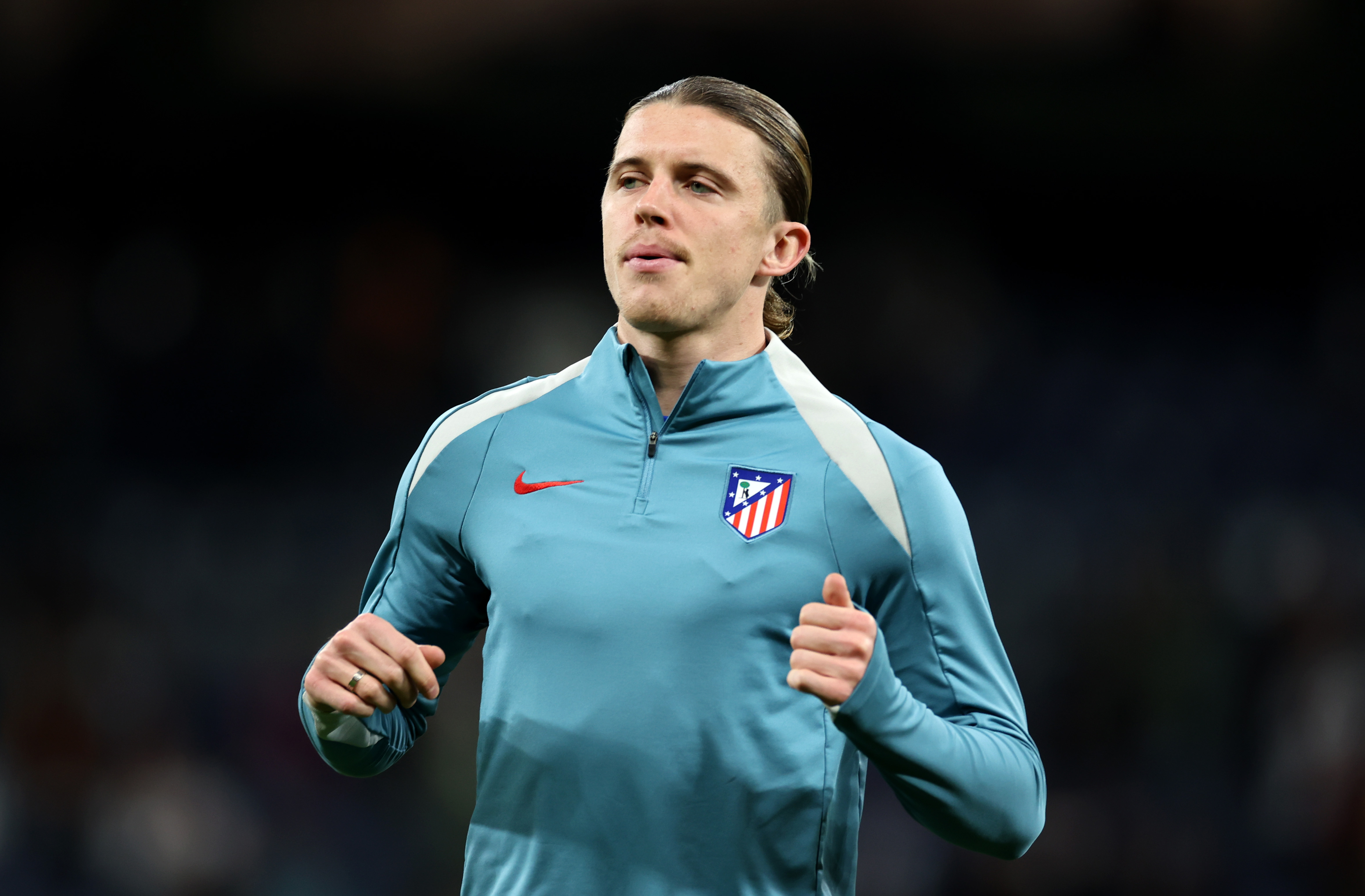 Conor Gallagher warms up before kick-off for Atletico Madrid.