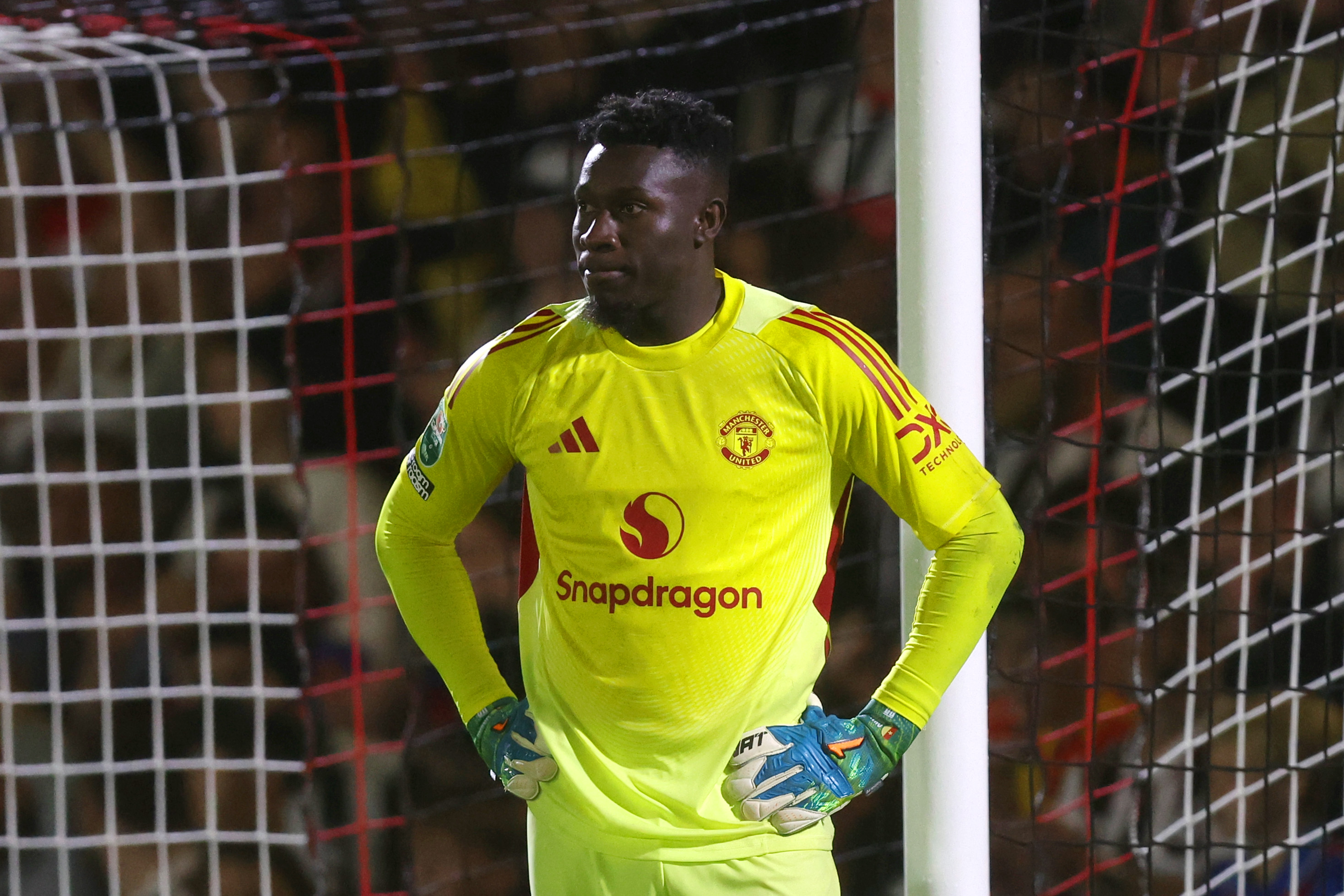 Andre Onana looks dejected after conceding to Grimsby Town.