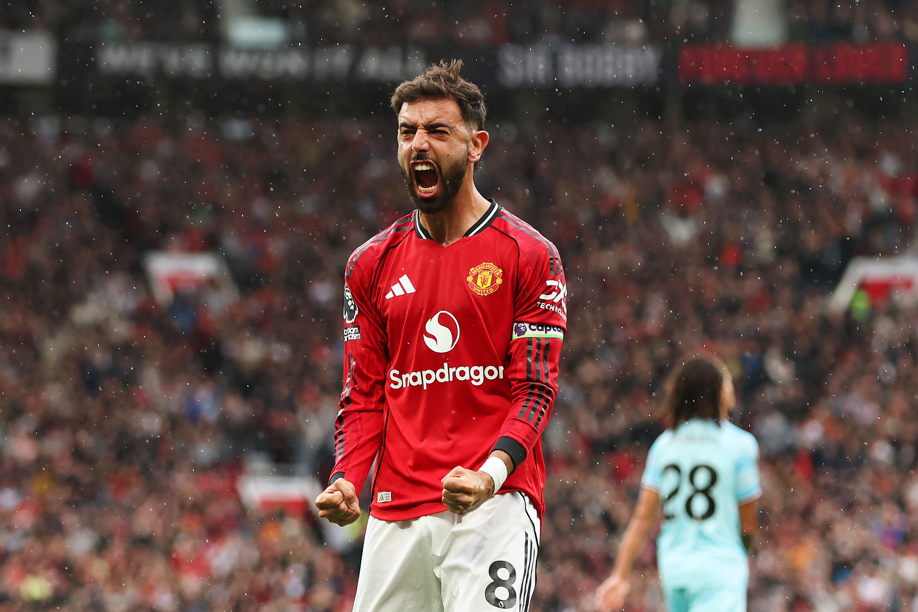 Bruno Fernandes celebrates after scoring a penalty.