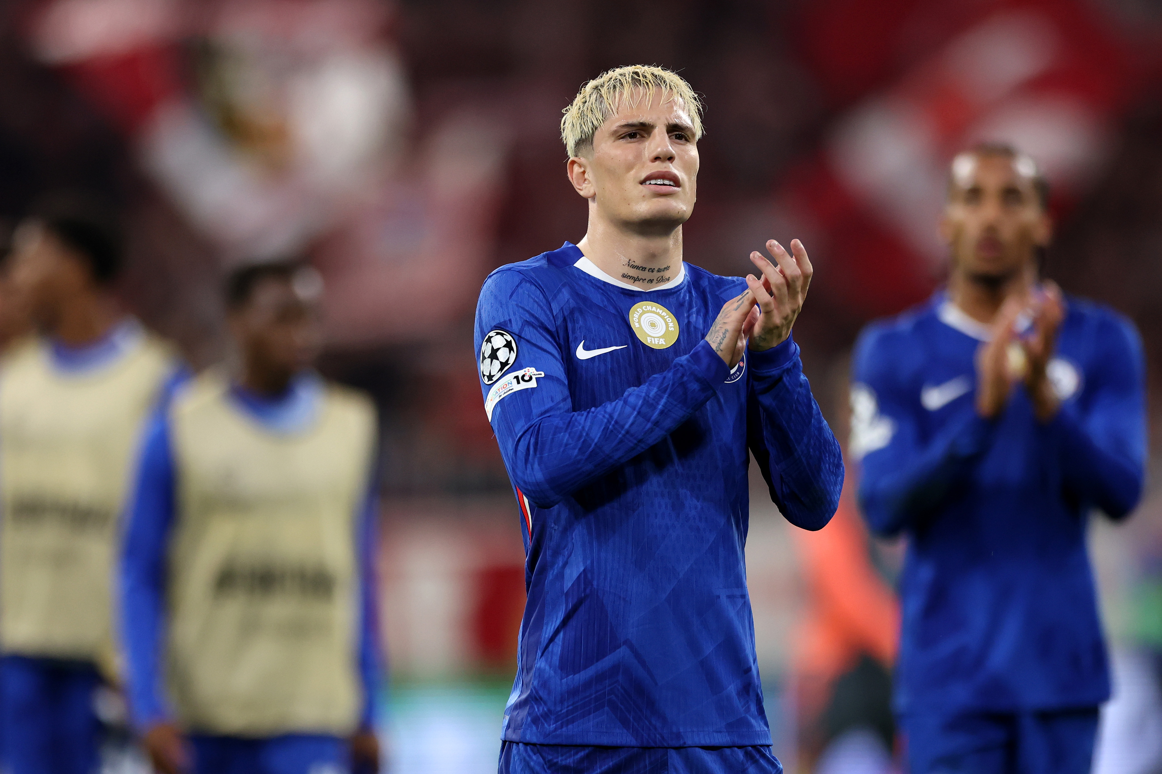 Alejandro Garnacho applauds the Chelsea fans at full-time vs Bayern.