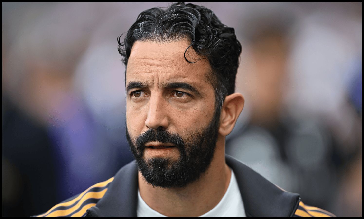 Ruben Amorim looks on from the touchline.