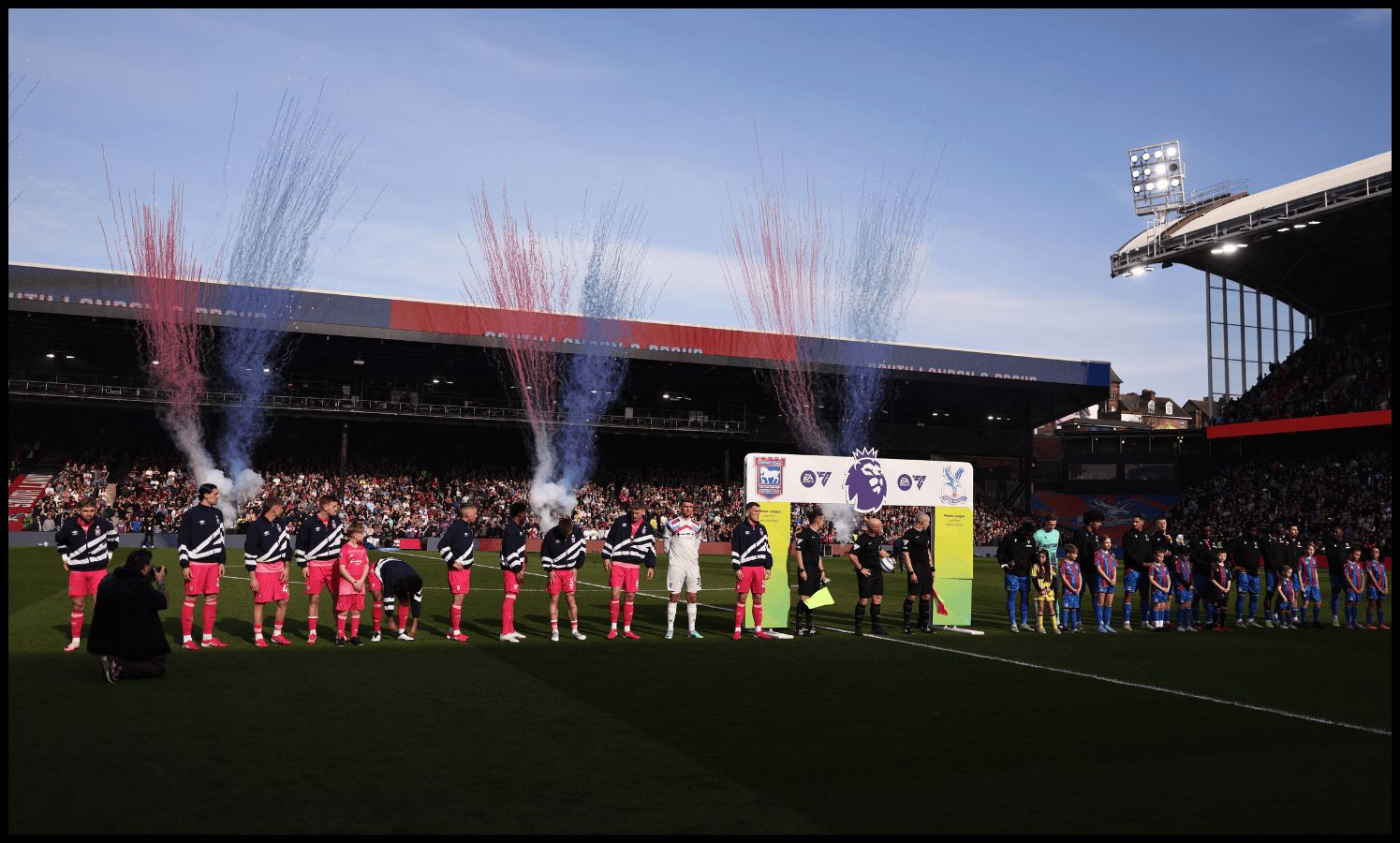 Crystal Palace players line up at Selhurst Park.