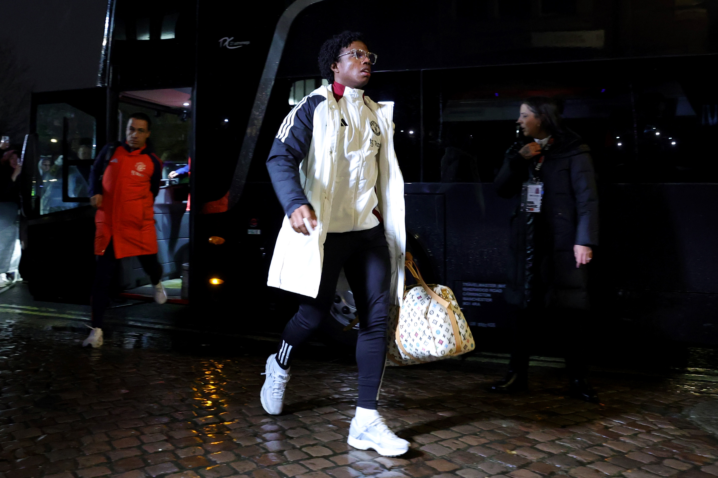 Tyrell Malacia arrives at Craven Cottage.