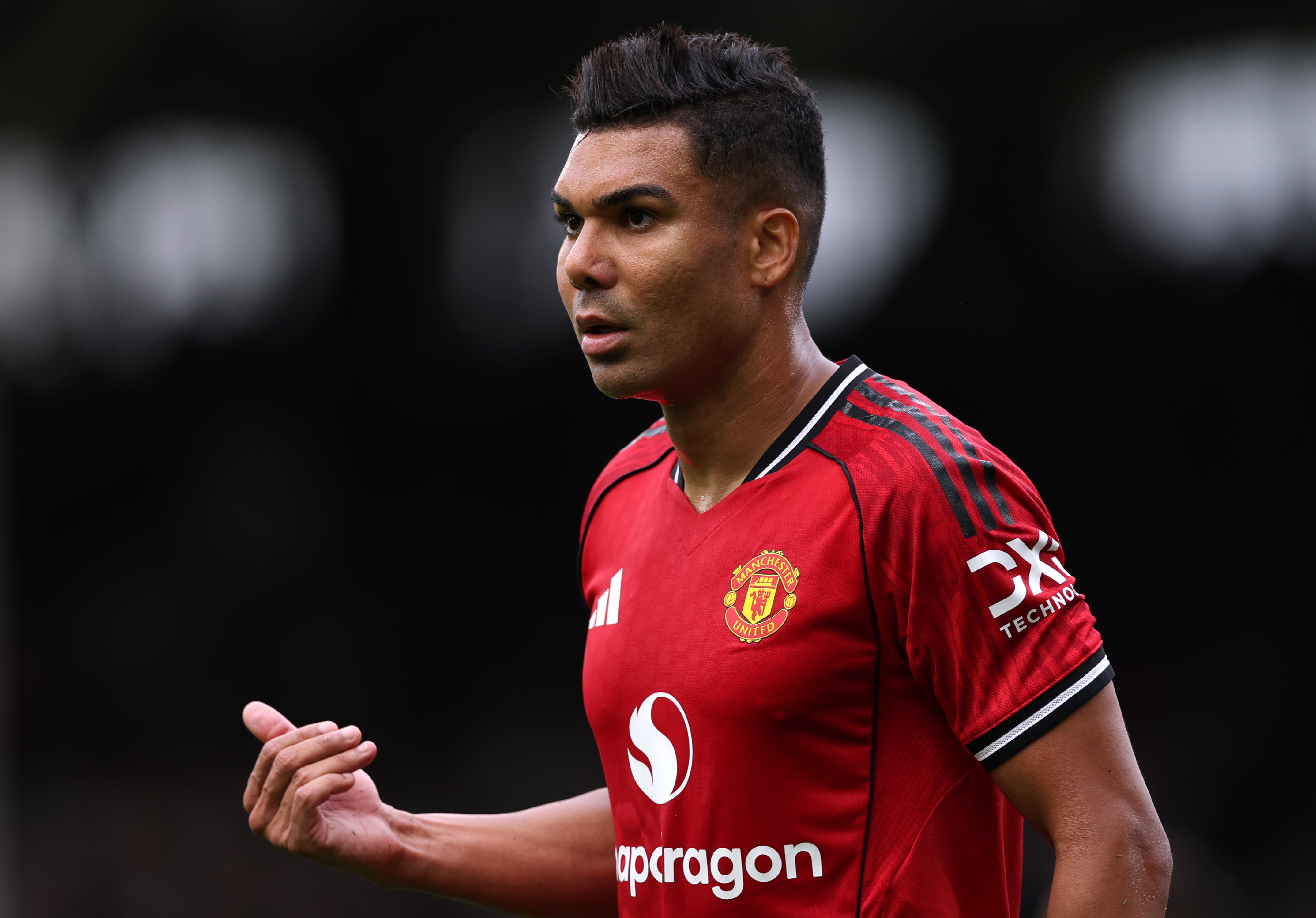 Casemiro gestures while in action for Man United against Fulham.