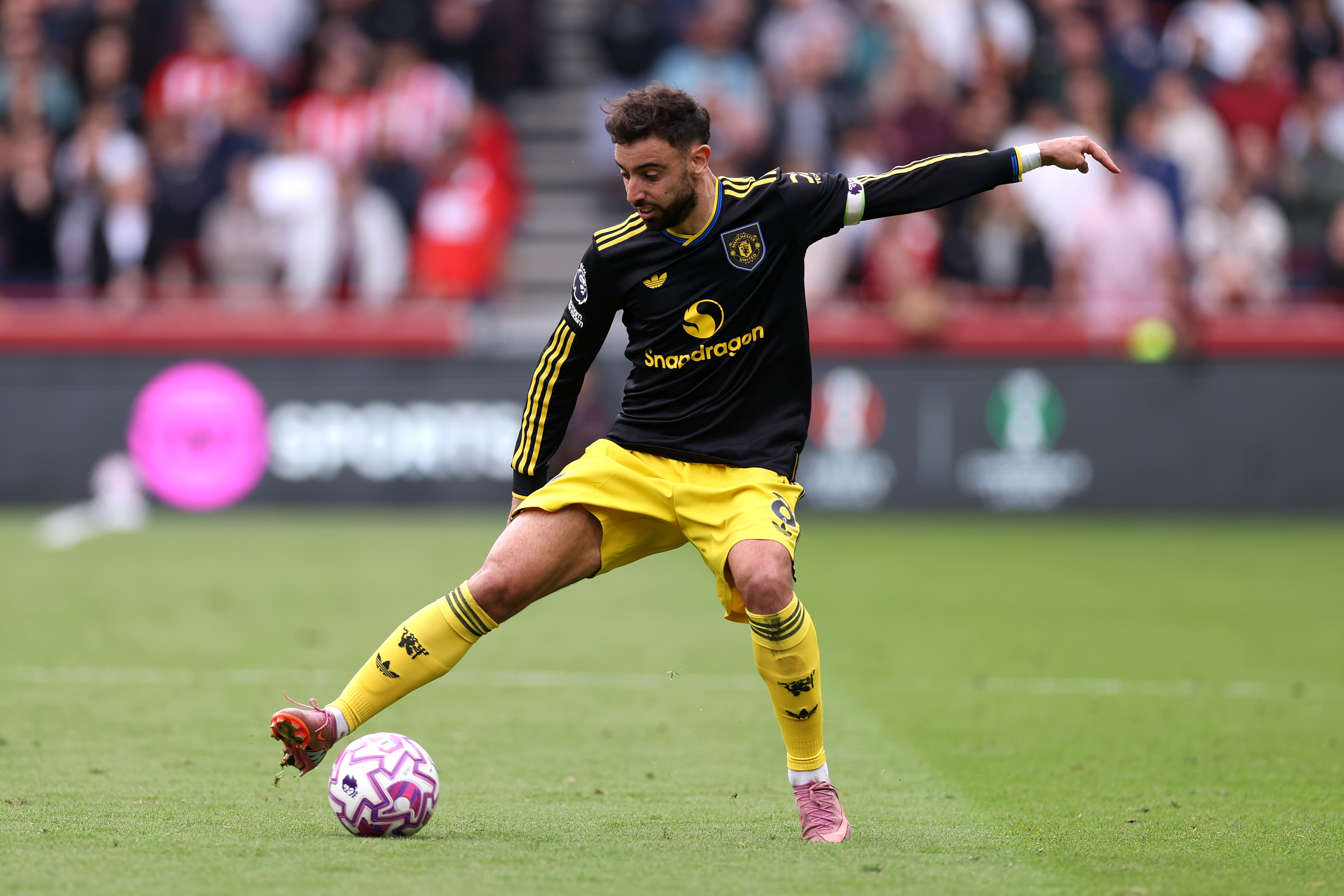 Bruno Fernandes controls the ball while in action for Man United against Brentford.
