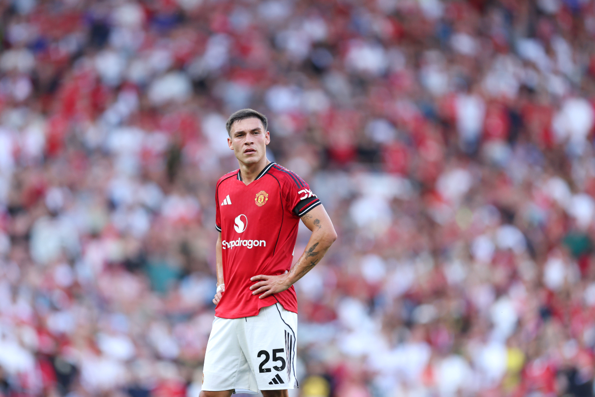 Manuel Ugarte looks on while in action for Manchester United against Arsenal.