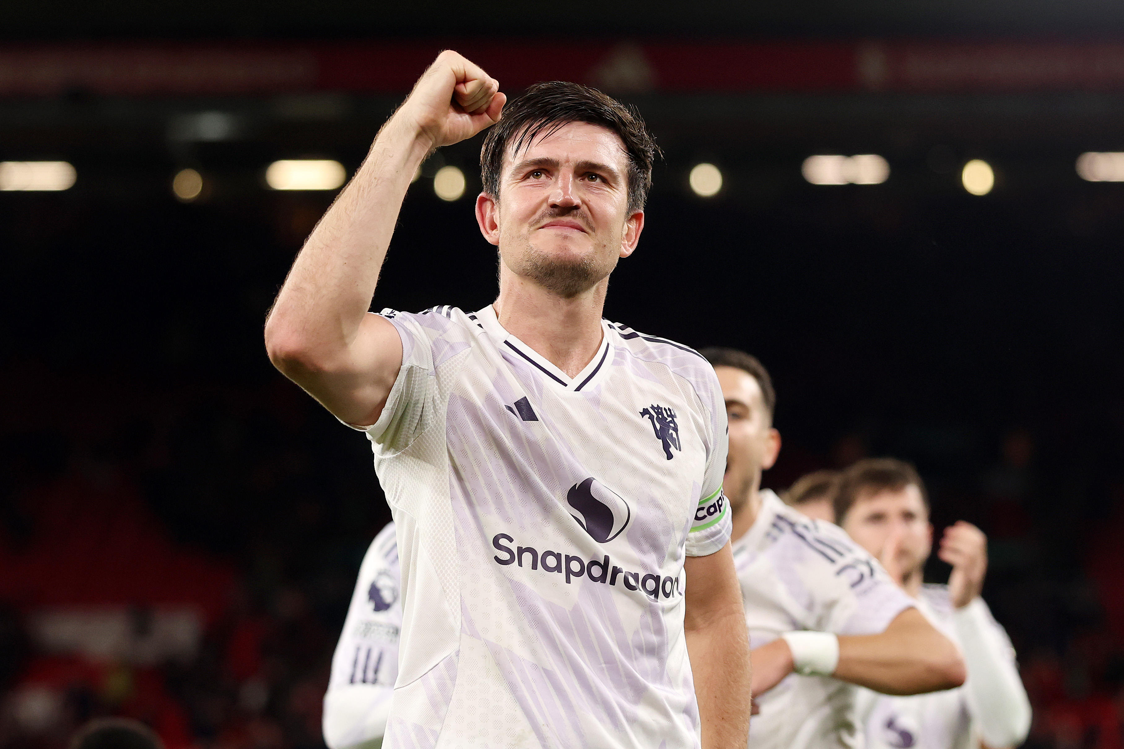 Harry Maguire celebrates after scoring the winning goal for Man United against Liverpool.