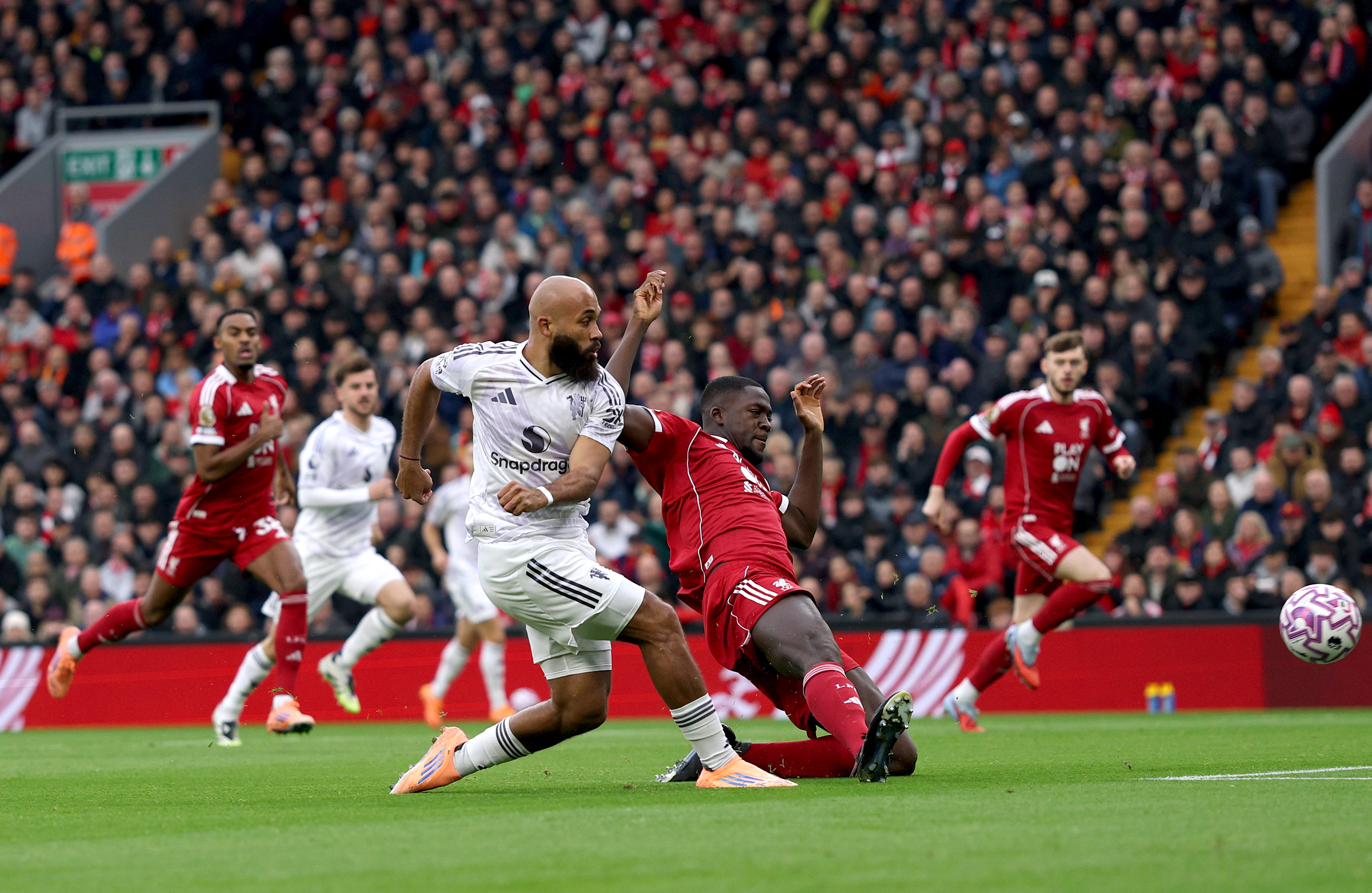 Bryan Mbeumo opens the scoring at Anfield.